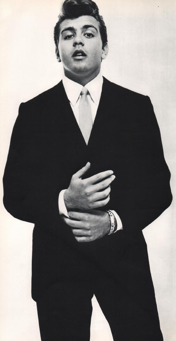 RICHARD AVEDON - Fabian: Artist: RICHARD AVEDON Print Title: Fabian Medium: Sheet-Fed Gravure Printed in 1964 Printed in Switzerland Image Size: 7.25 x 14 inches Richard Avedon(1923-2004) was an American fashion and portrait 