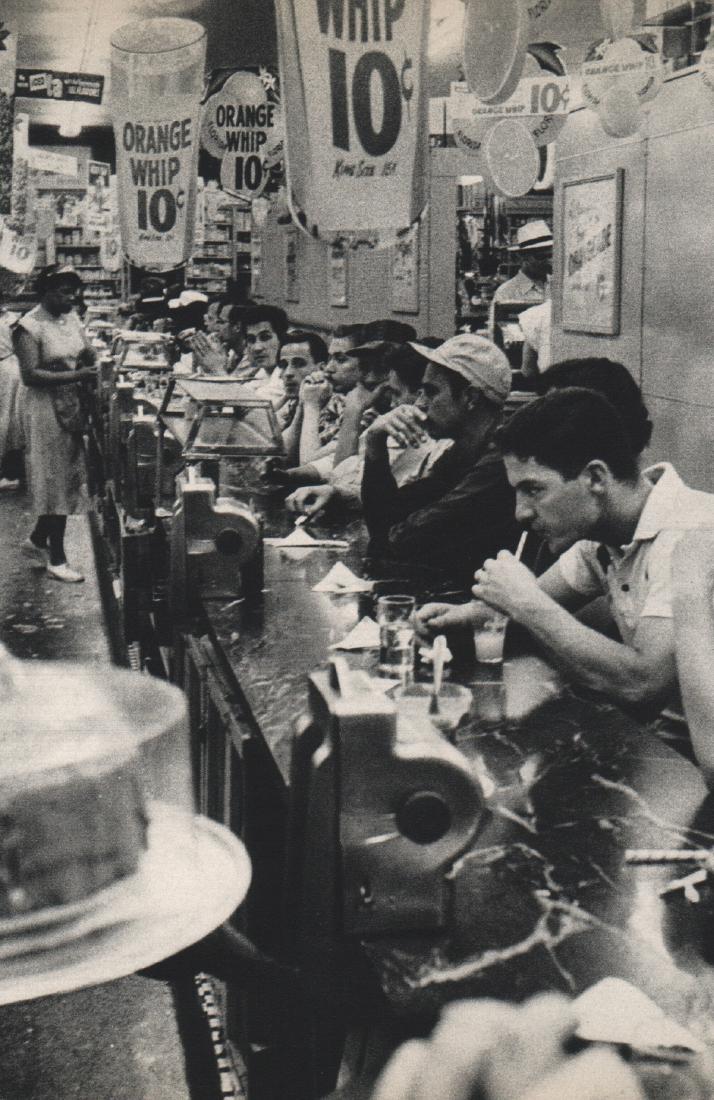 ROBERT FRANK - Detroit, Michigan: Artist: ROBERT FRANK Print Title: Detroit, Michigan, Lunch Counter Medium: Sheet-fed Gravure Printing Date: 1958 Printed in France Image Size: 4.5 x 6.5 inches Robert Frank (b. 1924) is an American ph