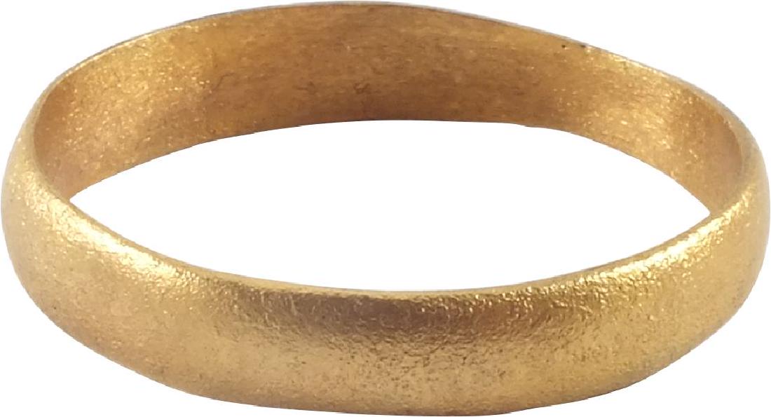 VIKING MAN’S WEDDING RING 10th-11th CENTURY: Gilt bronze. Rounded band. Size 11 1/4. Vikings exchanged wedding rings on the pommel of the groom’s sword. Item ships one business day after payment. Please note that this lot has a confidential re