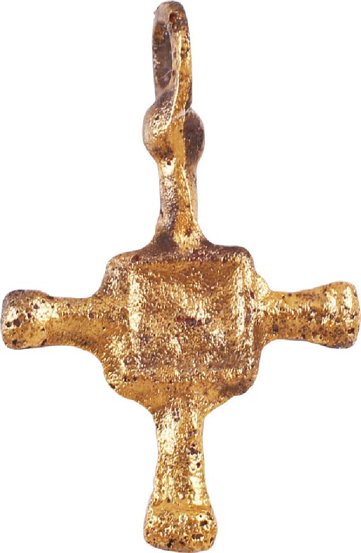 MEDIEVAL CHRISTIAN CROSS, 9th-10th CENTURY: Gilt bronze. 7/8” height, of early Gothic form. Lobed terminal beams with the cross beam centered. The junction with a raised saltire in a square each side. Worn to display conversion to Christianit