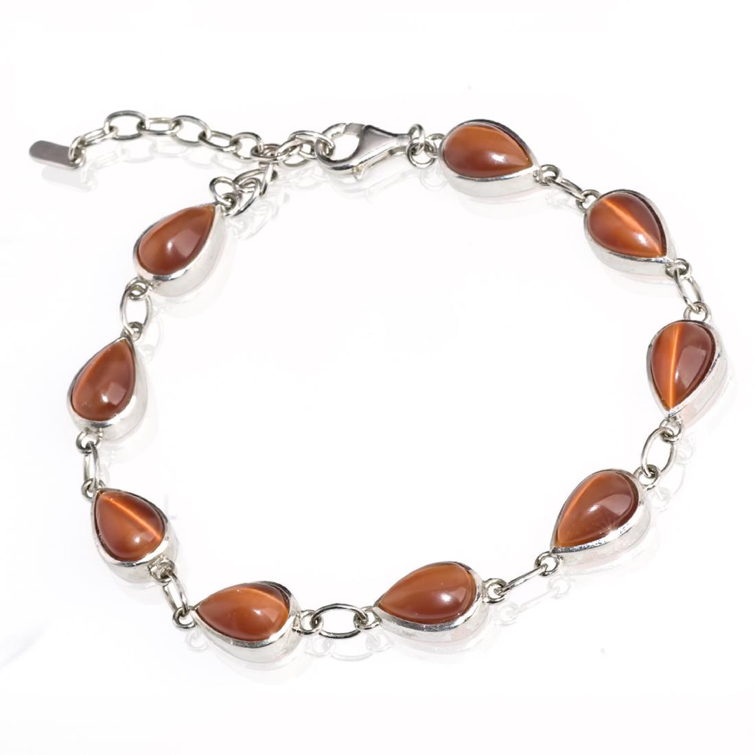 Vintage 925 Silver Bracelet with Tiger Eye: Item: Vintage 925 Silver Bracelet with Tiger Eye Metal Purity: .925 sterling silver Gemstones: Tiger Eye Size: External length (incl.clasp) ~7"-9" (18-23 cm) Bezel drop set Tiger Eye. 9 gemstones ~10x