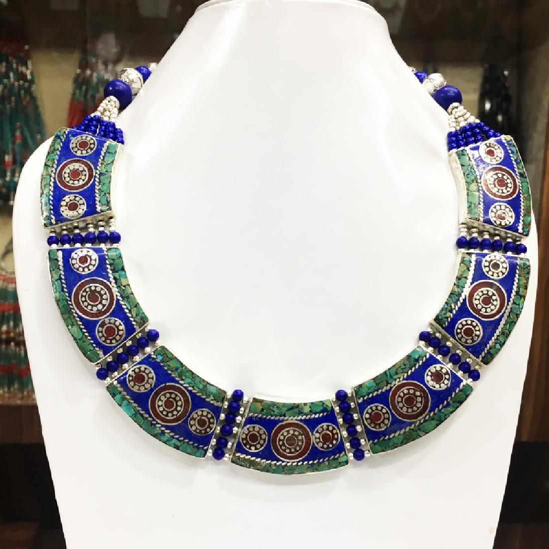 Tibetan Silver Lapis Turquoise & Coral Gypsy Necklace: Item: Handmade Traditional Nepalese Gypsy Necklace Origin: Tibetan Metal Purity: Tibetan silverHandmade Gemstones: Turquoise & Coral Size (inches): 22 Please note that this lot has a confidential rese