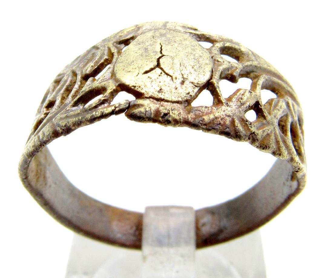 Tudor Wedding Ring with Open Work Design: Date: ca. 14th-16th C AD Material: Bronze Provenance: Obtained from an old British collection; Acquired at L.C.F. (London) Dimensions: 20mm; 2.7grams Superb Artifact - Tudor Wedding Ring with Open Wor