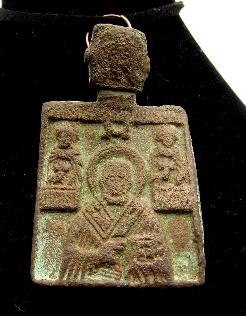 Medieval Icon with St. Nicholas: Date: 9th – 11th c. AD Material: Bronze Provenance: Obtained from an old British collection; Purchased from a private London collector, acquired between 1960-1990. Dimensions: 50mm; 17grams Medieval