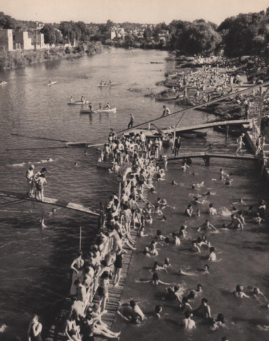 ROBERT DOISNEAU - Entre Joinville et Nogent-sur-marne: Artist: ROBERT DOISNEAU Print Title: Entre Joinville et Nogent-sur-marne Medium: Sheet-fed Gravure Printing Date: 1949 Printed in Switzerland Image Size: 6.5 x 8.5 inches Robert Doisneau (1912-1994) w