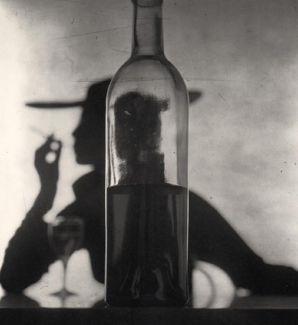 IRVING PENN - Girl behind Bottle, NY, 1949: Artist: IRVING PENN Print Title: Girl behind Bottle, NY, 1949 Medium: quad-tone Photoengraving Printed 1991 in the US Image size (inches) approx. 8 x 8” Irving Penn was an American photographer know