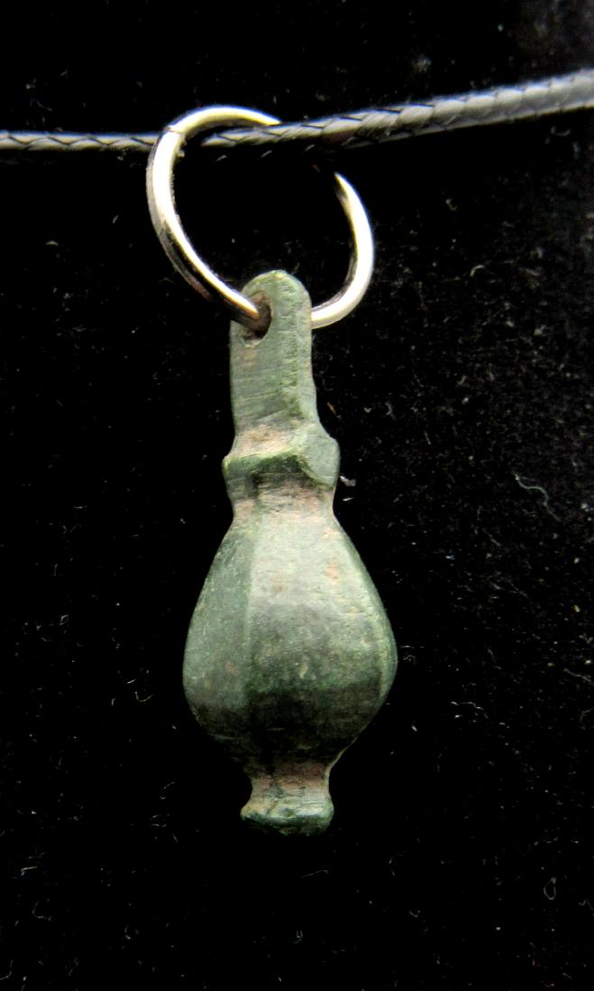 Medieval Viking Era Bronze Battle Mace Pendant: Date: circa 9th - 11th century AD Material: bronze Provenance: Obtained from an old British collection, acquired from the B.C.F. (Birmingham) Dimensions: 22mm; 2.8grams Medieval Viking Era Bronze Batt
