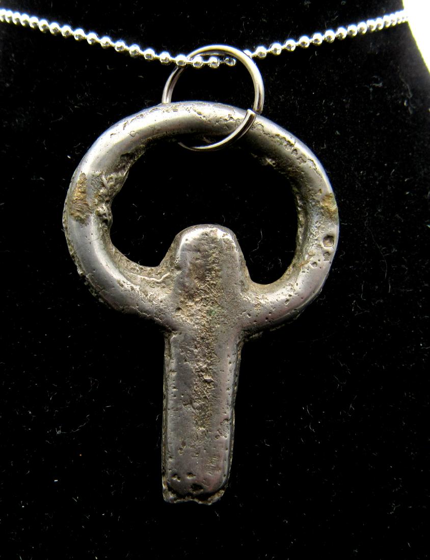 Medieval Viking Era Bronze Penannular Omega Brooch: Date: circa 9th - 11th century AD Material: bronze Provenance: Obtained from an old British collection, purchased from a gentleman in London Dimensions: 36mm; 7.4grams Medieval Viking Era Bronze Penan
