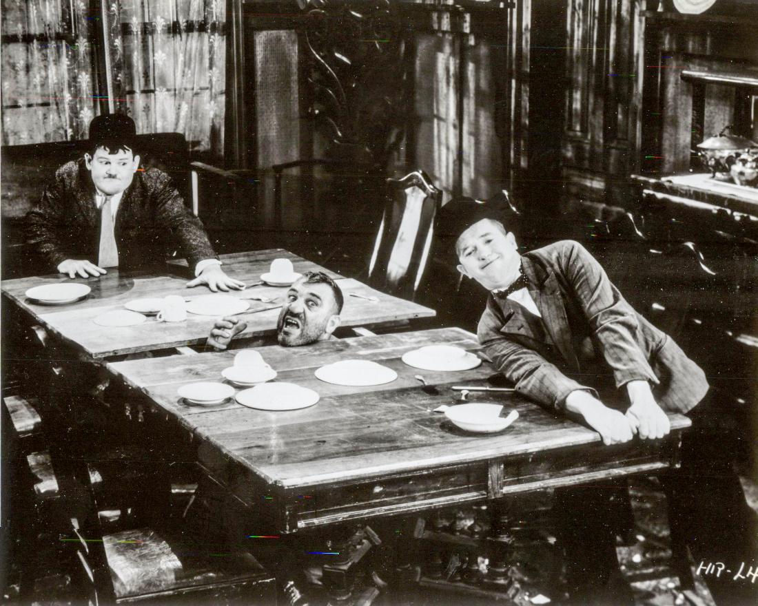 Production Still from the 1932 Laurel & Hardy Old Port: This is an 8" x 10" black-and-white production still for the 1932 James W. Horne film Any Old Port written by H.M. Walker and starring Stan Laurel and Oliver Hardy as themselves. Mugsie Long [Walter L