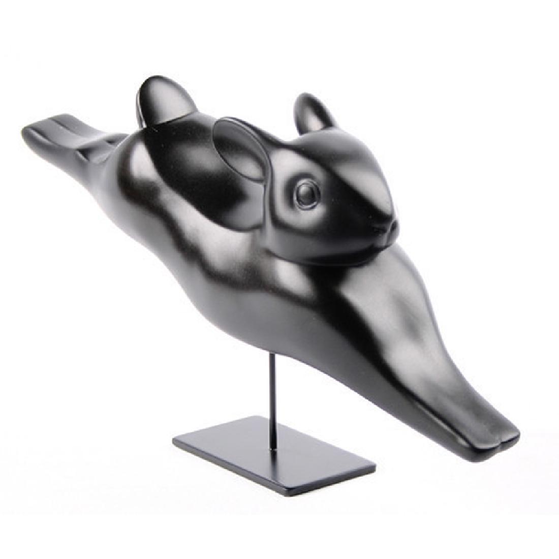 After François Pompon: Running Rabbit Lapin Courant: Item: After François Pompon: Running Rabbit Lapin Courant statue Maker: Mouseion Collection Origin: Netherlands Date/Period: 2017 Materials: Polystone Size: H. 5,90 x W 11,41 inch Running Rabbit Lapi