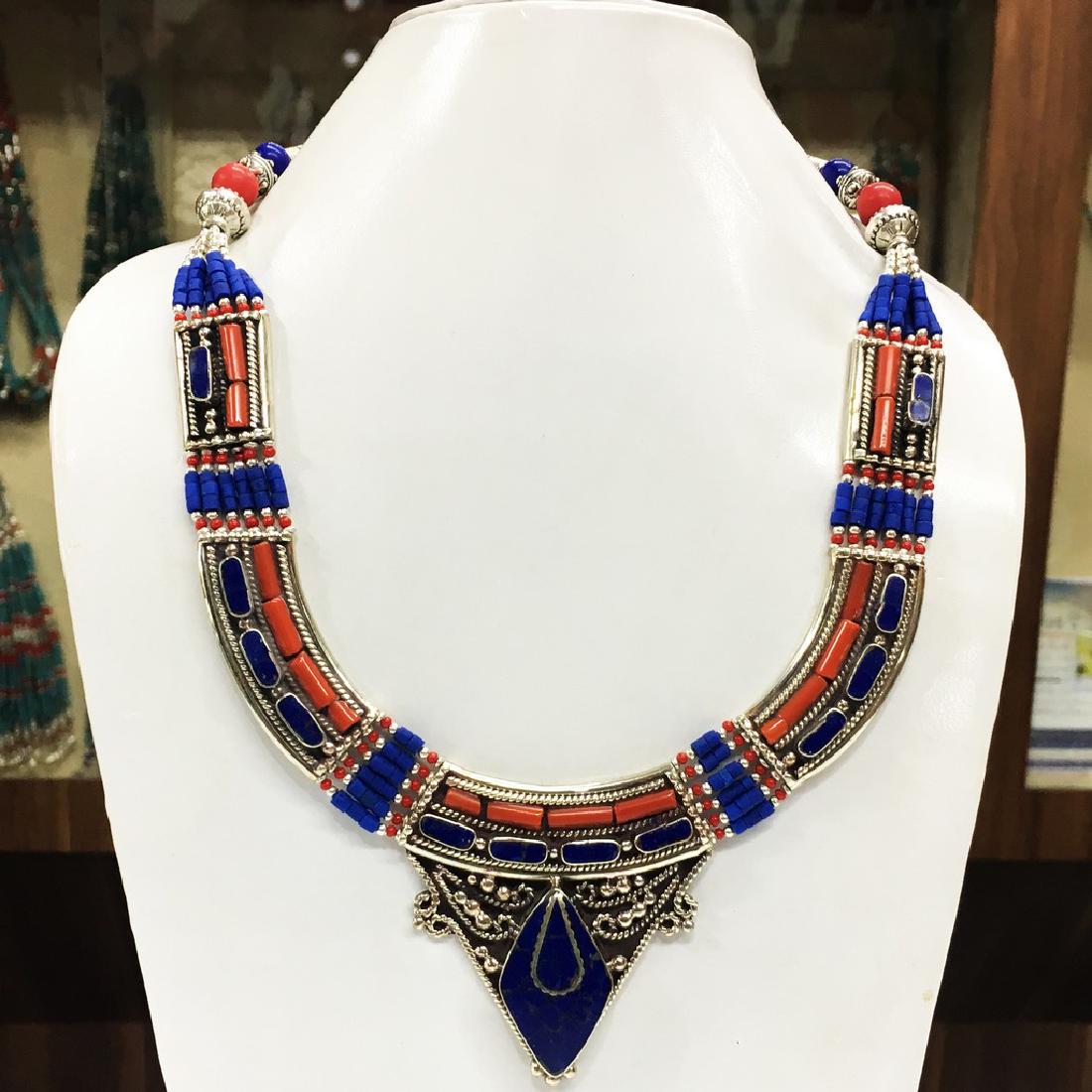 Traditional Tibetan Silver Lapis Coral Necklace: Item: Antique Traditional Vintage Choker Necklace Origin: Tibetan Metal Purity: Tibetan silver Handmade Gemstones: Turquoise & Coral Size (inches): 20 Please note that this lot has a confidential rese