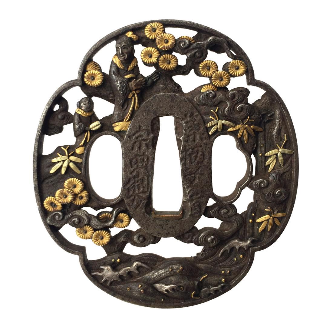 Signed Iron tsuba carved in marubori and inlaid with: Item: Signed Iron tsuba carved in marubori and inlaid with gold and silver, by S?ten;with provenance Origin: Japan Date: Edo period Materials: Iron, gold, silver or shibuichi Height: 78.5 mm; Width: 7