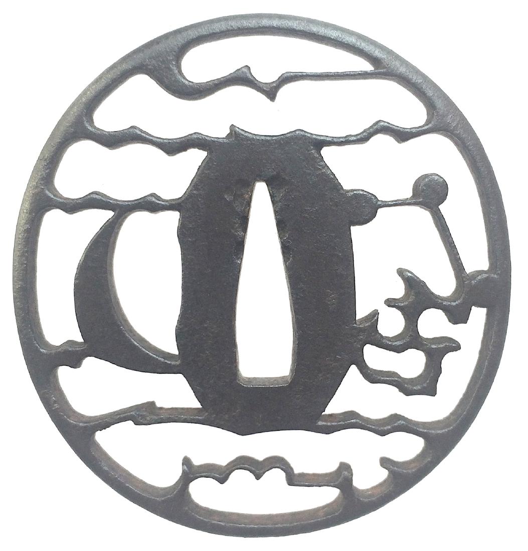 Akasaka school sukashi tsuba of iron: Item: Akasaka school sukashi tsuba of iron Origin: Japan Date: Edo period Materials: Iron Height: 73.0 mm; Width: 69.0 mm; Thickness: 5.5 mm; Weight: 67 g A round tsuba of iron with nice patina decora