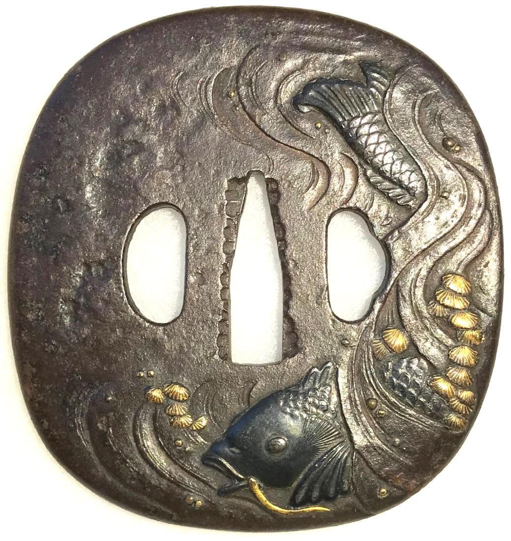 Large iron tsuba with shakudo and gold inlay with NBTHK: Item: Large iron tsuba with shakudo and gold inlay with NBTHK Kicho Token attestation Origin: Japan Date: Edo period Materials: Iron, gold, shakud? Height: 85.8 mm; Width: 80.7 mm; Thickness: 3.9 mm; 