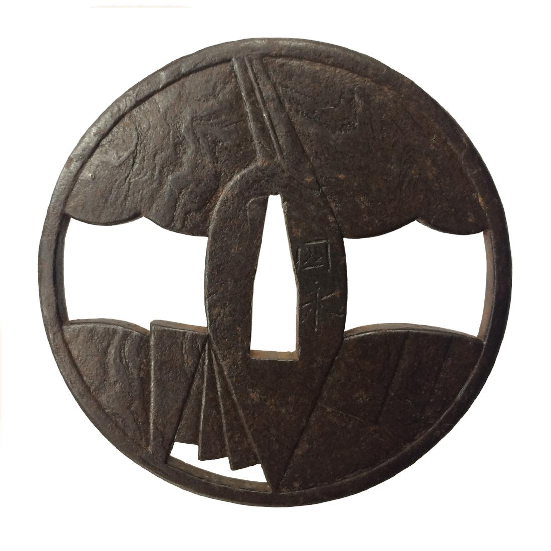 Iron tsuba with wood grain surface (mokume)byKuninaga: Item: Iron tsuba with wood grain surface (mokume)byKuninaga Origin: Japan Date: Edo period, 17th century Materials: Iron Height: 77.7 mm; Width: 77.7 mm; Thickness: 5.0 mm; Weight: 123 g Iron tsuba of
