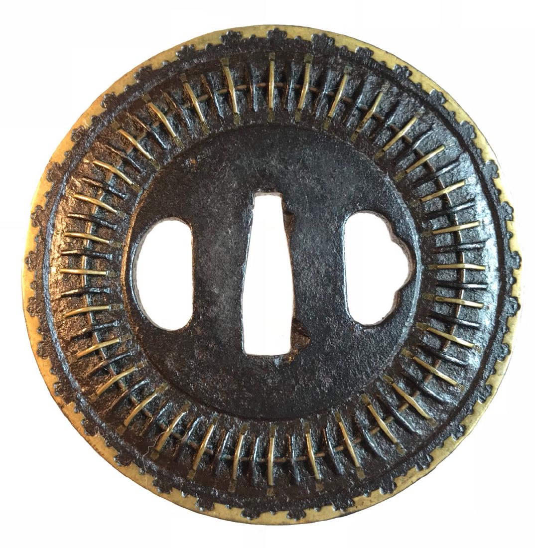 Shingen tsuba of mukade design with iron and brass wire; (1 of 3)
