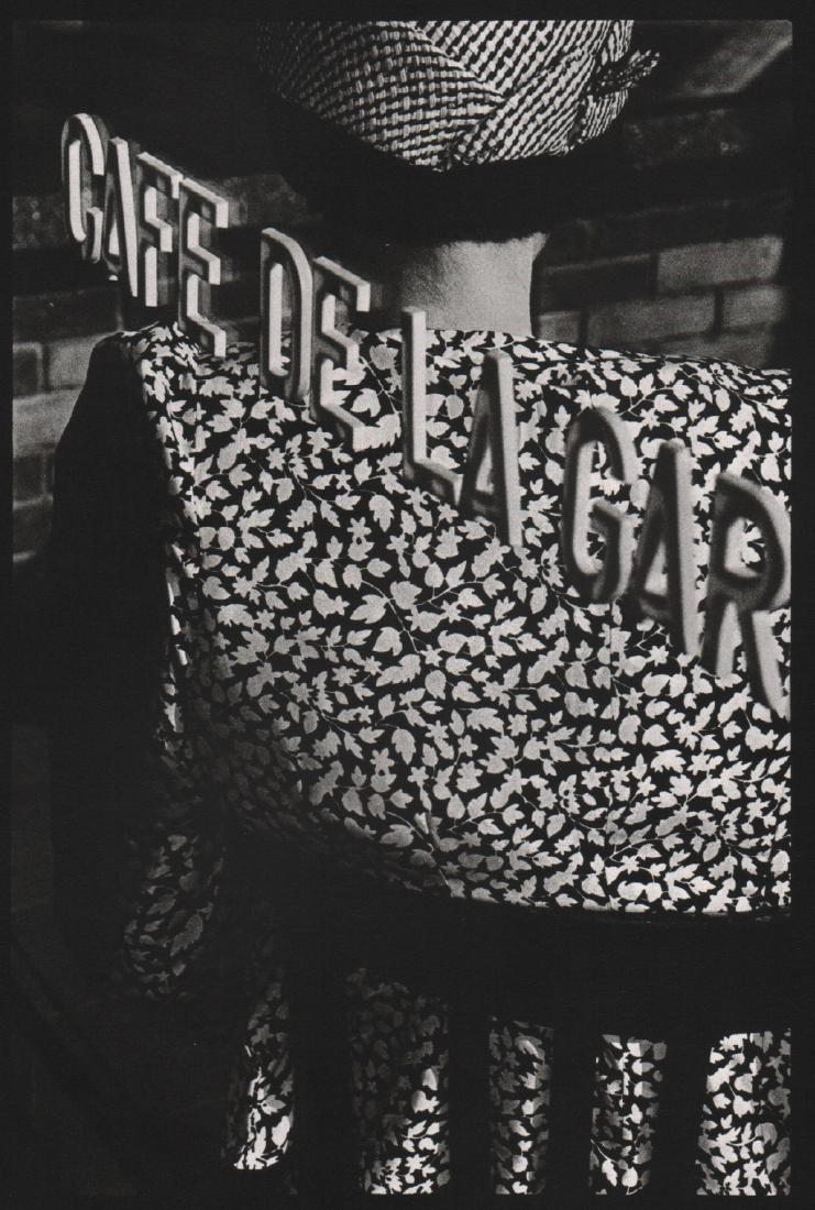 SARAH MOON - Café de la Gar: Artist: SARAH MOON Print Title: Café de la Gar Medium: Sheet-fed Gravure Printing Date: 1988 Printed in Spain Image Size: 5.5 X 8.5 inches Sarah Moon (born 1941), previously known as Marielle Warin,