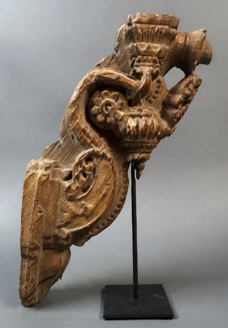 Carved Wooden Bracket - North West India: Carved wooden bracket - North West India - India 1st half 20th century Wood 38 cm Carved wooden brackets from India, with carvings on both sides of the brackets and along the edges in high relief with