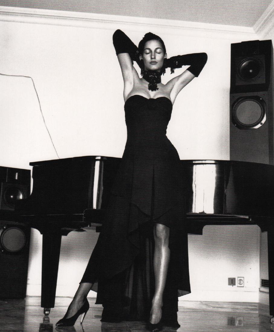 HELMUT NEWTON - Modeling a Karl Lagerfeld Dress: Artist: HELMUT NEWTON Print Title: Modeling a Karl Lagerfeld Dress Medium: Photo-Lithograph Printing Date: 2000 Printed in Italy Image size: 7.25 x 8.5 inches Helmut Newton (1920-2004) was a German-Au