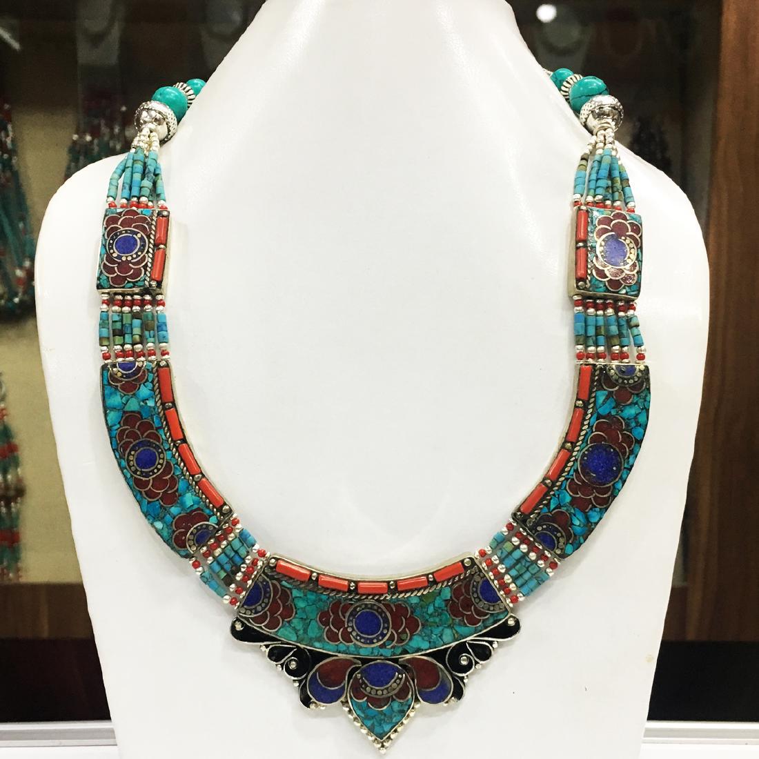 Tibetan Silver Turquoise Coral Necklace: Item: Tibetan & Nepalese Tibetan Silver Women's Necklace Origin: Tibetan Handmade Metal Purity: Tibetan silver Gemstones: Turquoise & Coral Size (inches): 1-21 Please note that this lot has a confiden