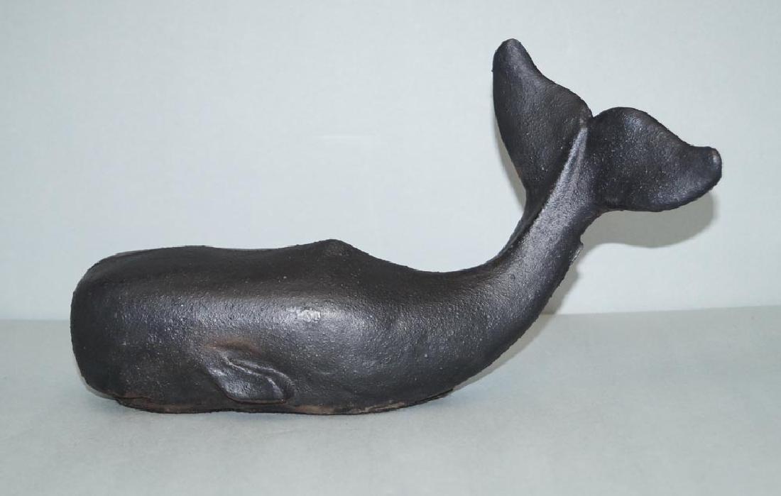 Whale Cast Iron Nautical Doorstop: Full-figure Whale with tail up 7 turned Antique Doorstop. Circa 1930’s. Very good condition 7 ¼” H. x 12 5/8” L. x 3 ½” W. Please note that this lot has a confidential reserve. When you le