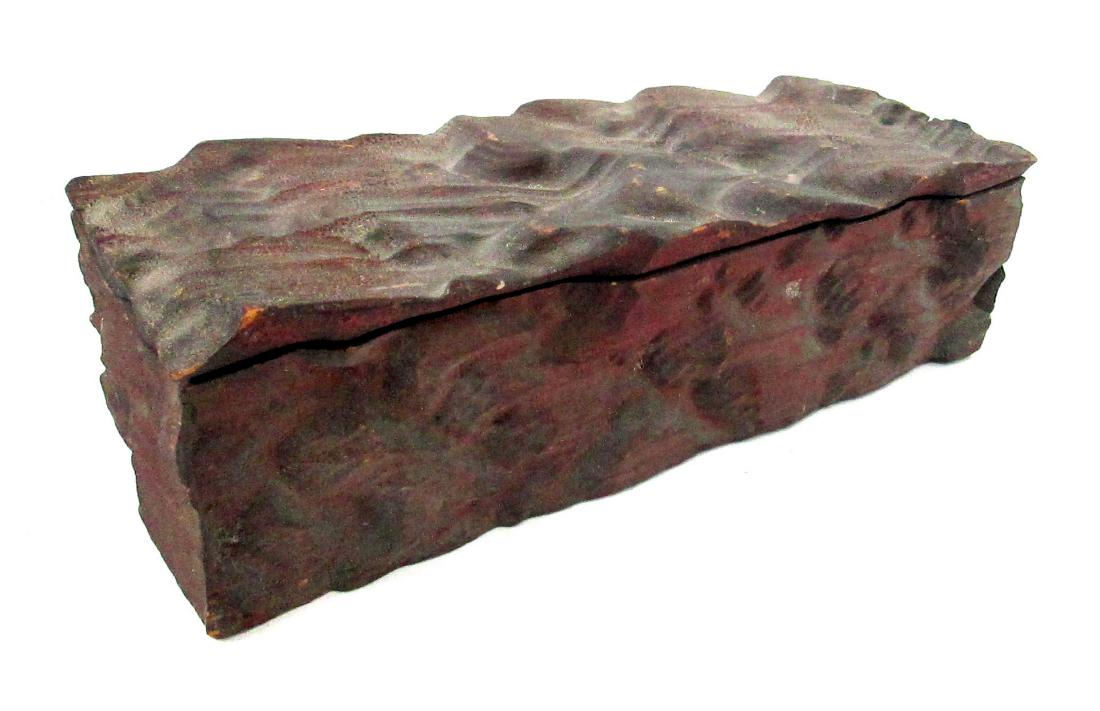 Red Painted "Wave" Carved Box: Red Painted "Wave" Carved Box C 1894 Pine 4 1/4"H X 15 1/8"W X 5 1/2"D Amazing "wave" relief carved trinket or map box. Dry, crusty original red painted surfaces, mitered corner joints, original brass