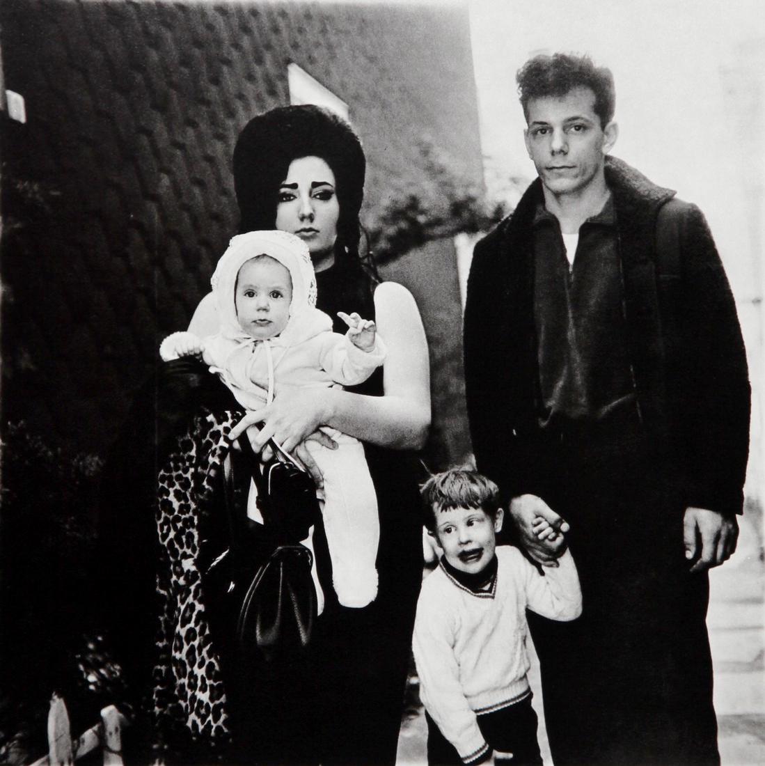 DIANE ARBUS - Young Family sunday outing New York 1966: Artist: Diane Arbus Title: Young Family sunday outing New York 1966 Date Printed: 1979 Medium: HelioGravure Printer: Electa Italy Printer Location: Milan 25 x25 cm - 10x 10 inch, Mount Size: 30x40 cm 