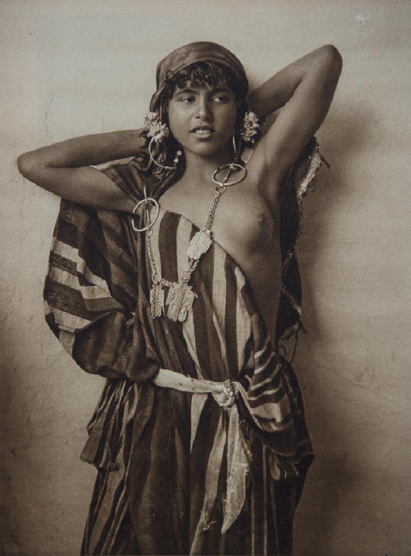 LEHNERT & LANDROCK - Tunisian Bedouin Girl: Artist: Lehnert & Landrock Title: Tunisian Bedouin Girl1927 Sheet Fed Gravure, Germany Dimensions: 6x8.25" Heat Mounted on 11x14" archival conservation board Lehnert & Landrock is the name of a photog
