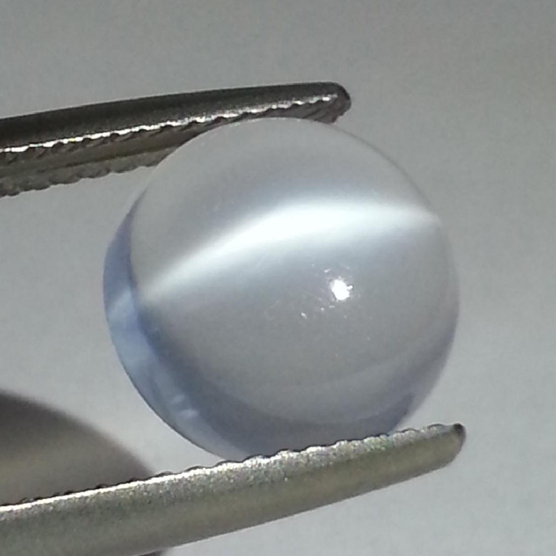Moonstone Cat's Eye - 5.1 Carat Loose: Item: Moonstone Cat's Eye - 5.1 Loose gemstone Color/Clarity: IF - VVS Carat Weight: 5.1 Size (mm): 11.03 x 11.10 x 4.79 Round - Srilanka No Reserve: This lot starts at $1 and has no reserve as a cour