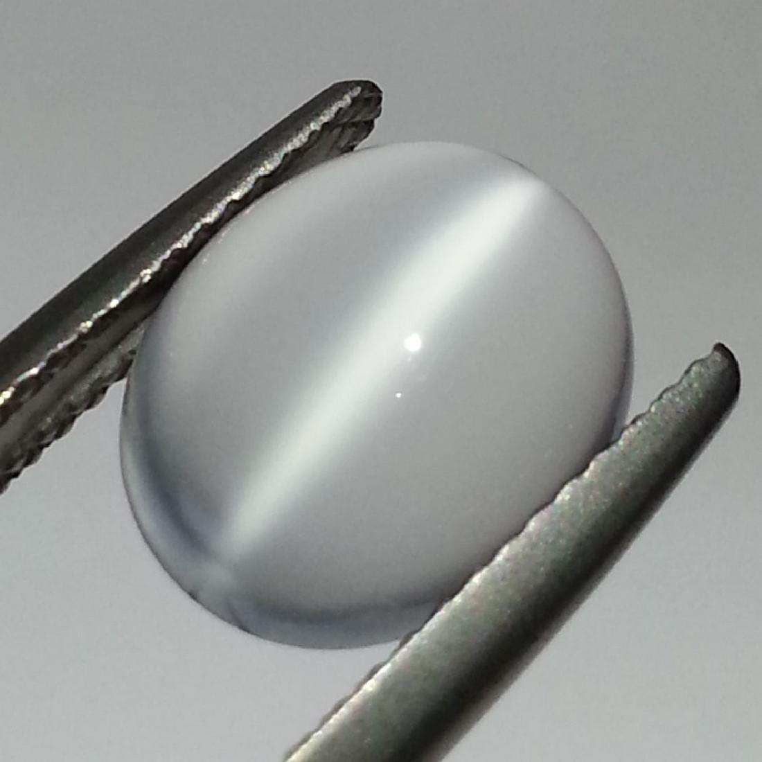 Moonstone Cat's Eye - 3.92 Carat Loose: Item: Moonstone Cat's Eye - 3.92 Loose gemstone Color/Clarity: IF - VVS Carat Weight: 3.92 Size (mm): 11.00 x 8.81 x 5.63 Oval - Srilanka No Reserve: This lot starts at $1 and has no reserve as a cour