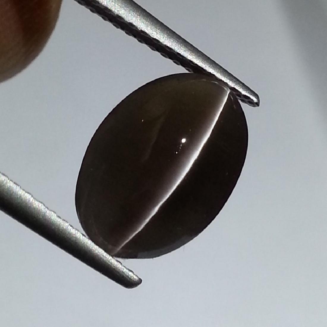 Scapolite cat's Eye - 4.36 Carat Loose: Item: Scapolite cat's Eye - 4.36 ct Loose gemstone Color/Clarity: VVS Carat Weight: 4.36 Size (mm): 11.65 x 8.40 x 5.00 Oval - Africa No Reserve: This lot starts at $1 and has no reserve as a courtesy