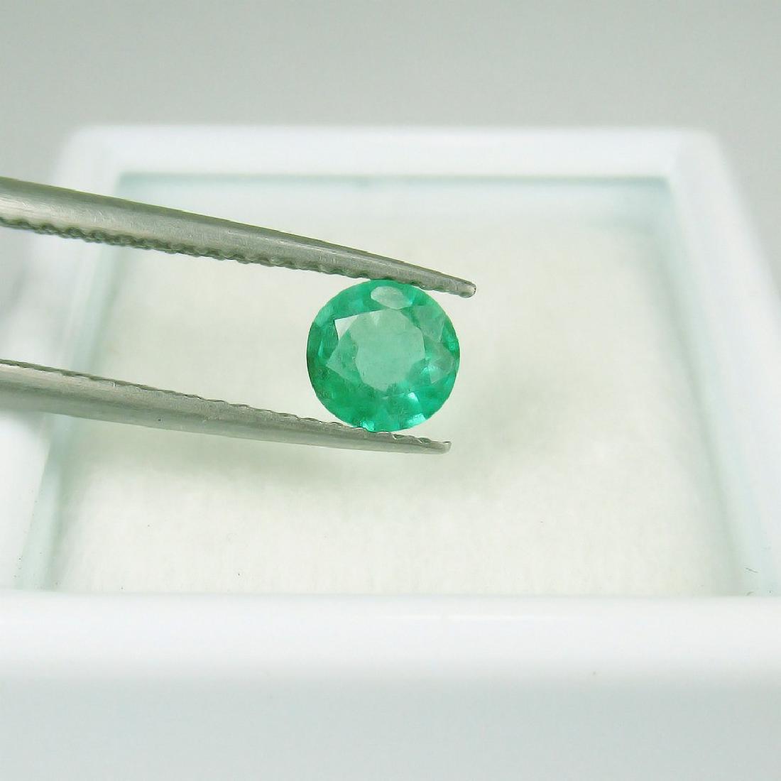 0.52 Carat Loose Zambian Emerald Round cut (1 of 2)
