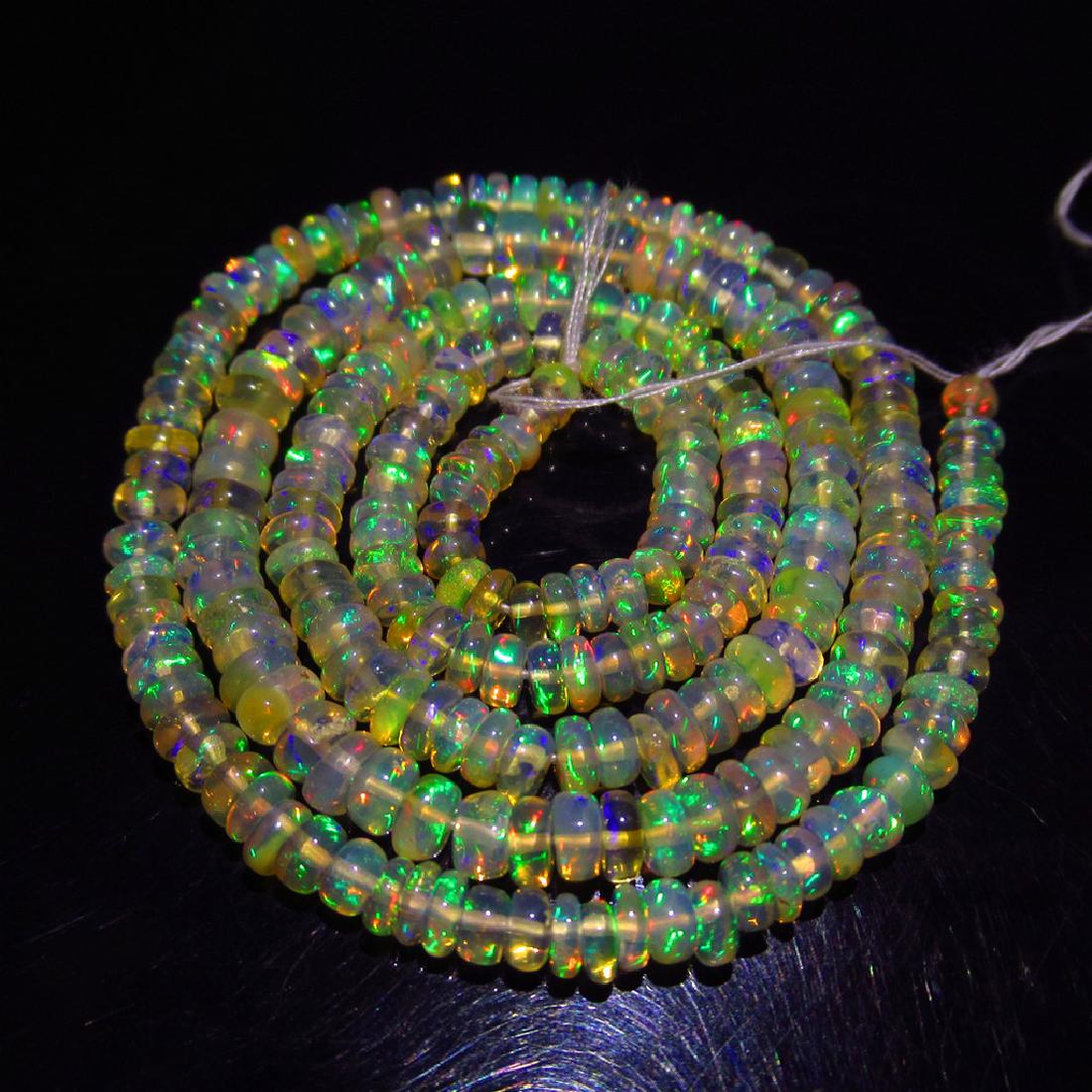 29.58 Carat 250 Drilled loose Ethiopian Fire Opal Beads (1 of 4)