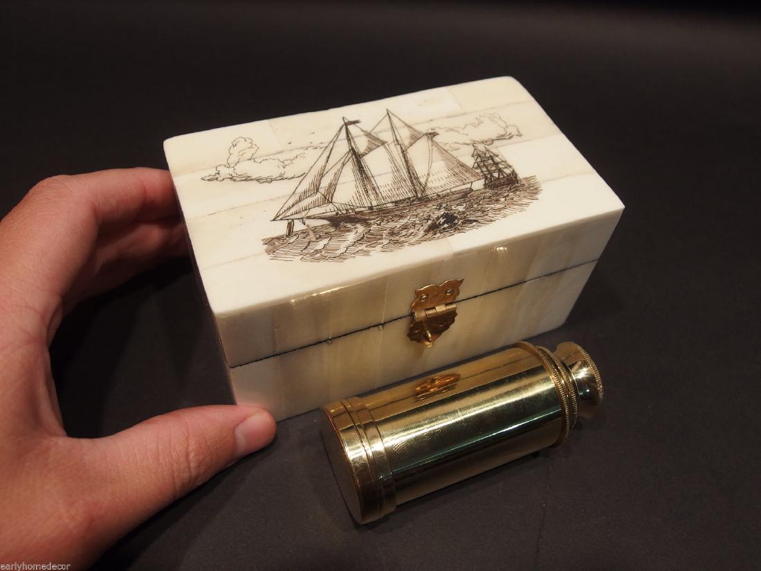 Ship Etched Bone & Wood Trinket Box w Telescope: Antique Style Folk Art Sail Ship Scrimshaw Bone & Wood Trinket Box Description The Box is 4 3/4" Long x 2 5/8" Wide x 2 1/2" High The telescope is 3 1/4" Long closed 6 3/4" open Wonderful new reproduc