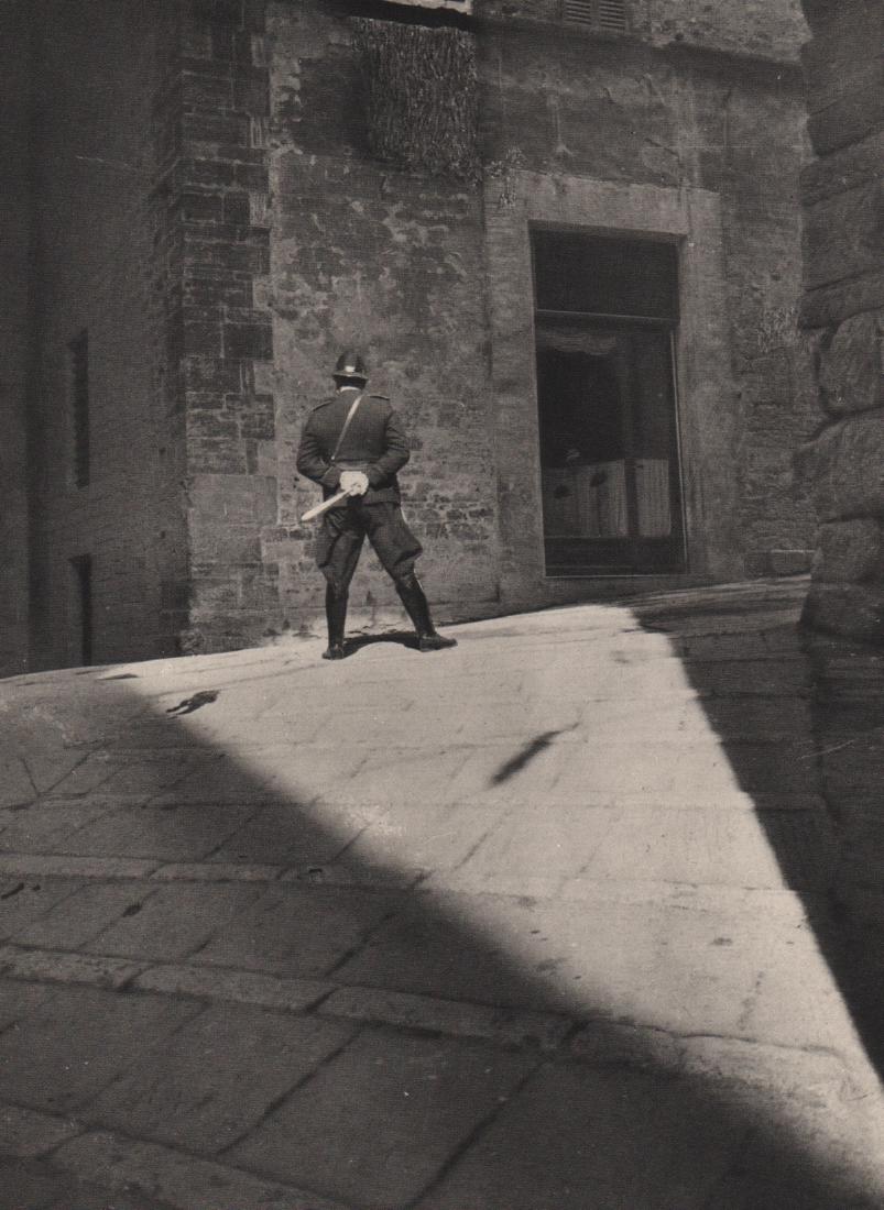 E.O. HOPPE - Policeman, Italy: Artist: E.O. HOPPE Print Title: Policeman, Italy Medium: Sheet-fed Gravure Printing Date: 1935 Printed in England Image Size: 6.25 X 8.5 inches Emil Otto Hoppe (1878-1972) was a German-born portrait, 