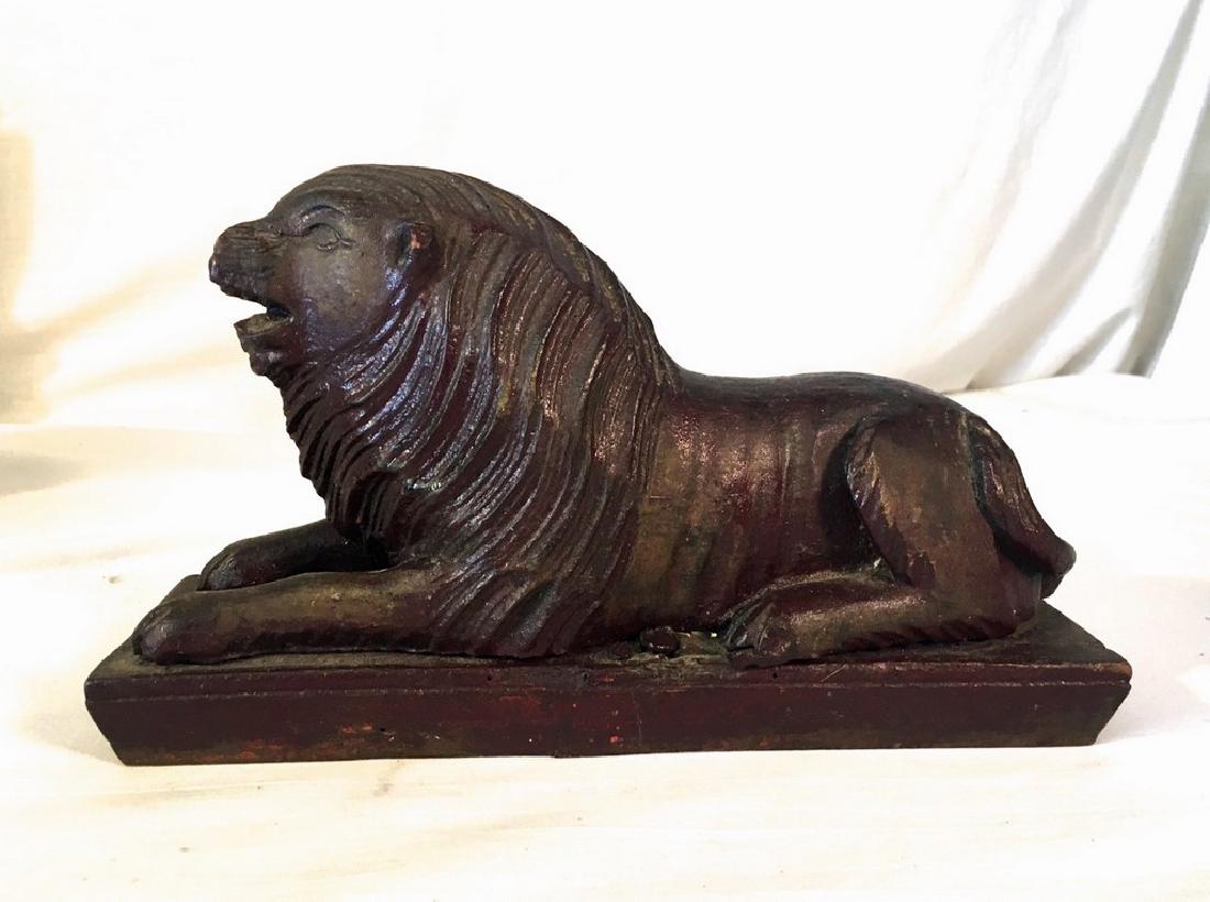 19th Century Carved and Painted Wood Lion: 19th Century Carved and Painted Wood Lion Old painted and varnished surface. Possibly Masonic or other fraternal object 10" L 3" W 6"H 1870-1890 Please note that this lot has a confidential reserve. W