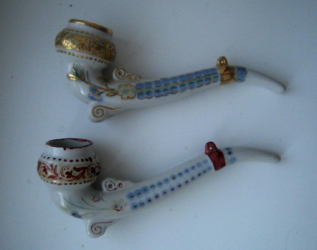2 Ukrainian porcelain pipes: 2 Ukrainian porcelain pipes Smoking Pipes in Ukrainian national style Material - porcelain Height - 10 cm Length - 22 cm ?ondition - Good. Please look photos Shipping from Ukraine can be up to 15 - 30
