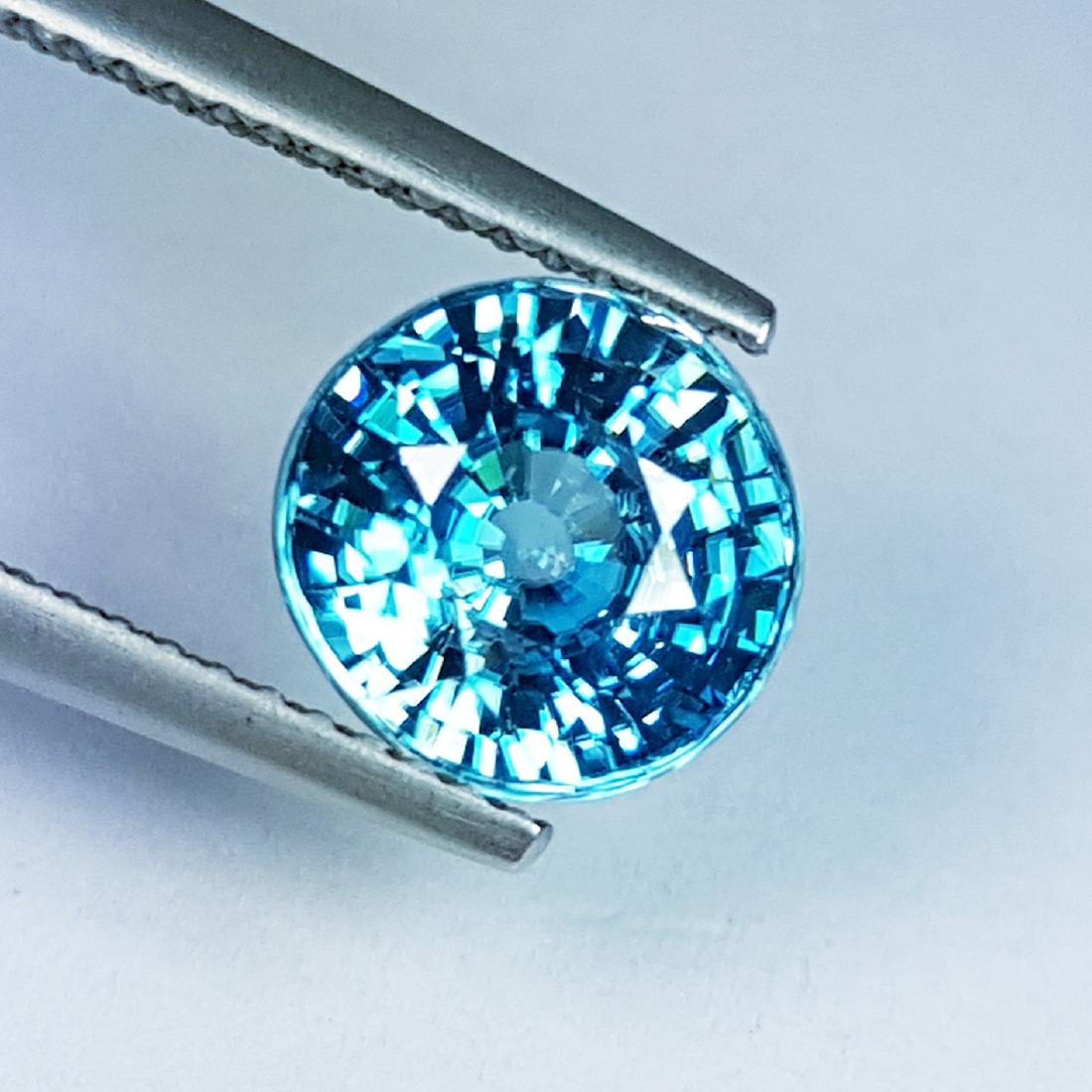 Blue Zircon - 3.88 Carat Loose: Item: Blue Zircon - 3.88 ct Loose gemstone Color/Clarity: VVS - VS Carat Weight: 3.88 Size (mm): 8.10 x 8.10 x 5.80 Round - Cambodia No Reserve: This lot starts at $1 and has no reserve as a courtesy 