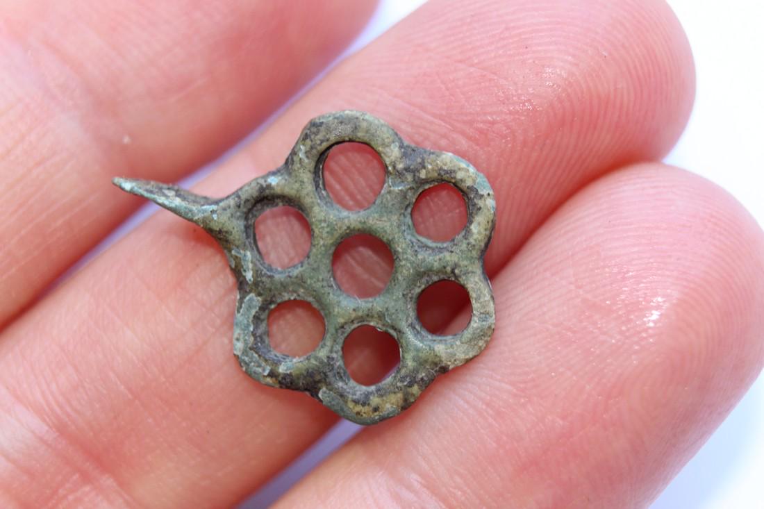 Medieval Bronze Amulet Pendant Flower: Medieval bronze amulet pendant flower- 22x17 mm Origin: European Period: 9 th -14 th century AD, Kievan Rus Materials: bronze Size: 22x17 mm place of discovery - Ukraine, Ukrainian private collection 
