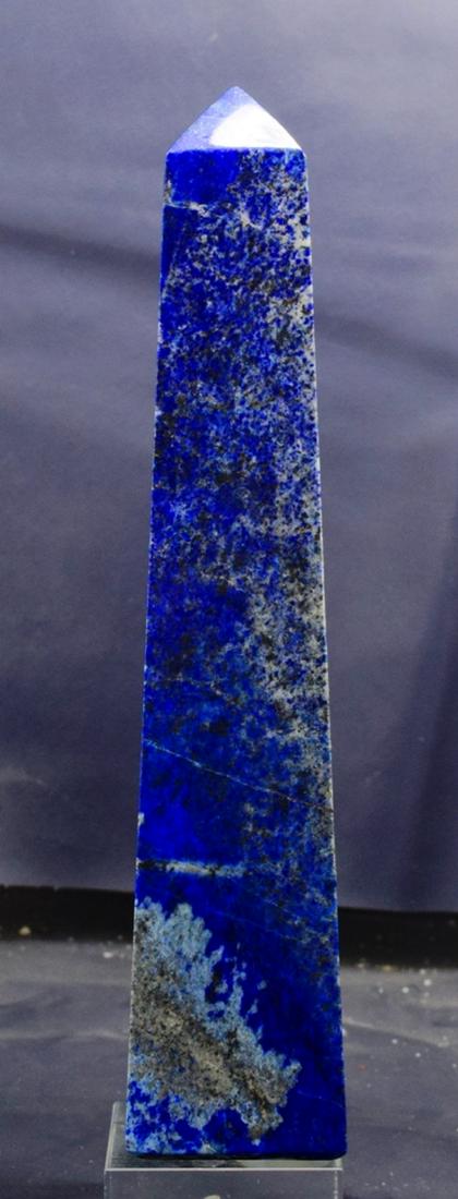 Top Grade Natural Lapis Lazuli Obelisk: Top Grade Natural Lapis Lazuli Obelisk Weight : 976 Gram Size : 225*53*52 mm Treatment : Natural Origin : Badakhshan Afghanistan Standard DHL Shipping Please note that this lot has a confidential rese