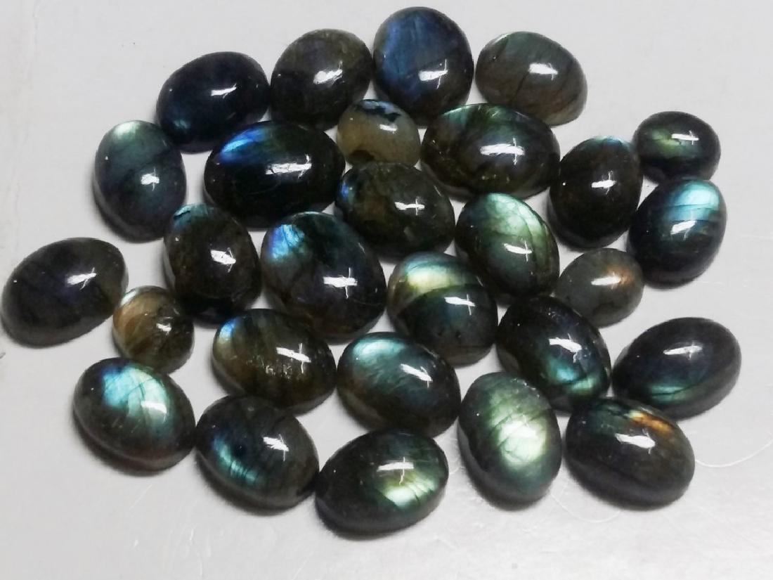 Natural Labradorite Gemstone: Item: Natural Labradorite Gemstone Gemstones: Labradorite Carat Weights: 195 Size/Dimensions: 14 x 10 x 6 No. of Pcs: 28 Please note that this lot has a confidential reserve. When you leave a bid in a