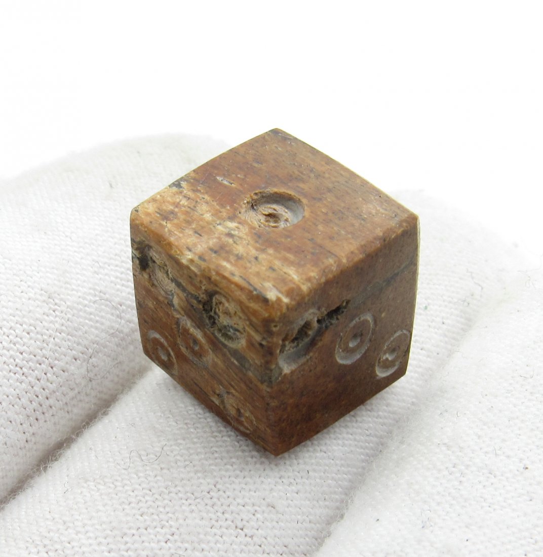 Ancient Roman Bone Die/Dice Gambing Piece: Ancient Roman Bone Die/Dice Gambing Piece Circa 1st – 3rd c. AD Ancient Roman Bone Die/Dice Gambing Piece. Professionally cleaned and polished to show original details. This item includes a free gif