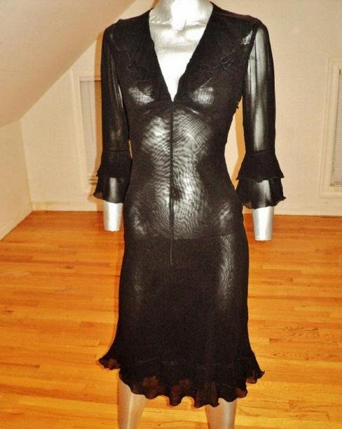 Moschino Silk Layering Ruffled Dress Ribbon Tie Front: A true beauty of a little black layering dress by Moschino Italy Double layers and ruffled at hem and sleeves in amazing vintage condition A Beauty. Bust-34" Waist-28" Hip-38 Please note that this lot