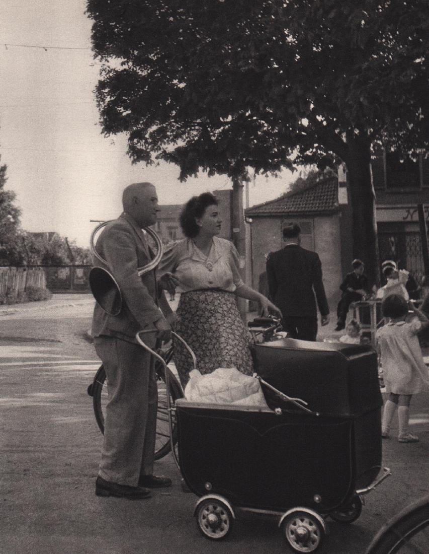 ROBERT DOISNEAU - Sunday in the Suburbs: Artist: ROBERT DOISNEAU Print Title: Sunday in the Suburbs Medium: Sheet-fed Gravure Printing Date: 1949 Printed in Switzerland Image Size: 6 x 7.5 inches Robert Doisneau (1912-1994) was a French phot