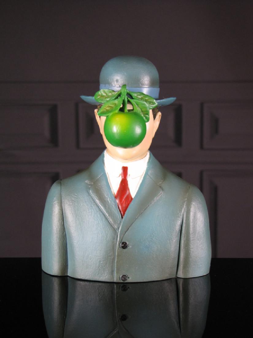 After René Magritte: The Son of Man statue: Item: After René Magritte: The Son of Man statue Maker: Mouseion Collection Origin: Netherlands Date/Period: 2017 Materials: Polystone Size: H. 5,36 x 4,78 inch The Son of Man statue, inspired by the