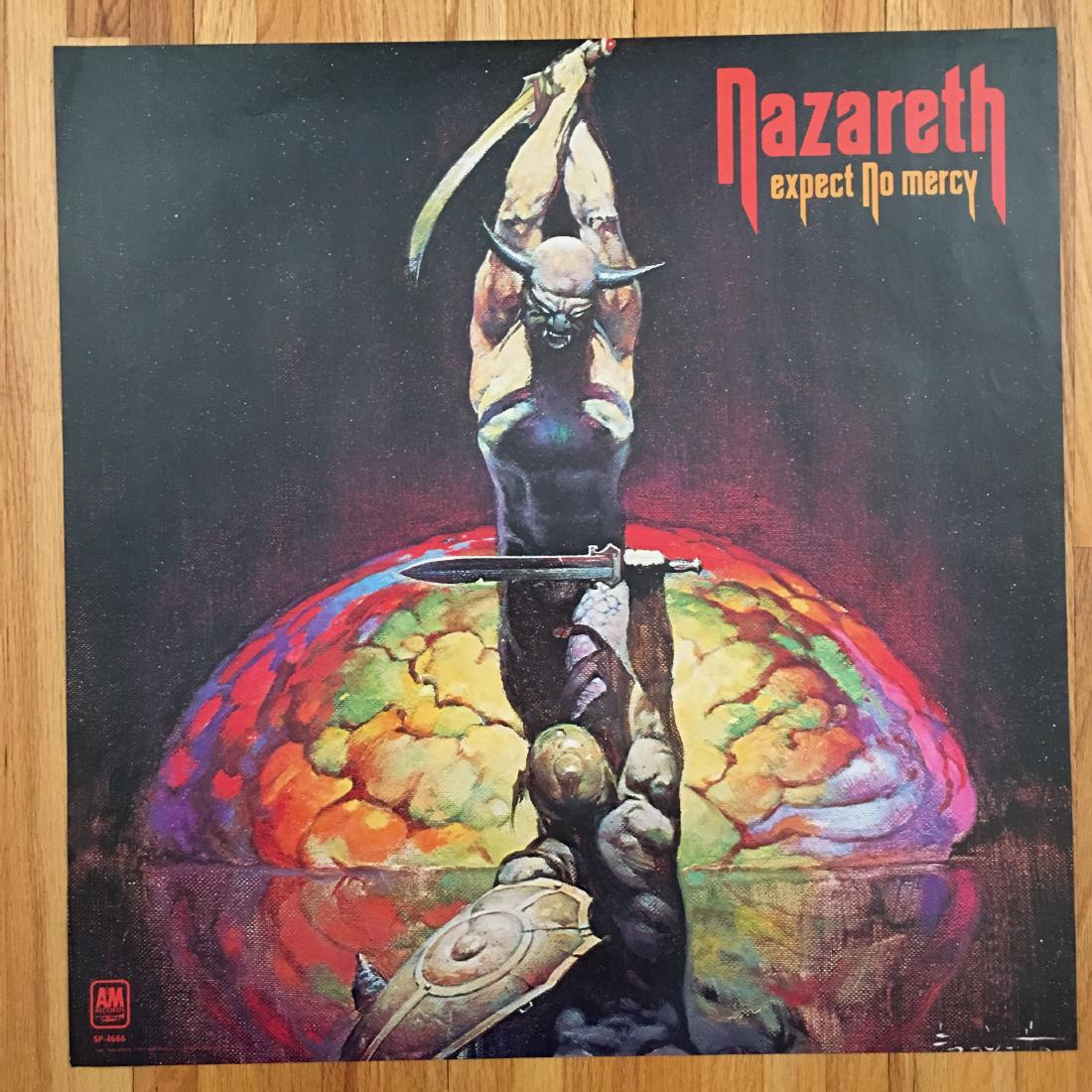 NAZARETH - EXPECT NO MERCY - Promo Poster: NAZARETH - EXPECT NO MERCY - Promo Poster. MOST POSTERS IN THIS SALE ARE NEW OLD STOCK - AND STILL SEALED! PURCHASED FROM A HEAD SHOP THAT CLOSED IN THE 1970's. We have multiple dozens of each of thes