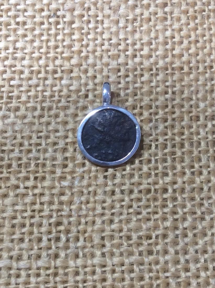 Sterling Silver Pendant with Silver Coin, Roman Empire: Item: Sterling Silver Pendant with Silver Coin, Roman Empire late Metal Purity: Sterling silver/ silver Year/Period: 200's-early 400's CE Weight: 3.0 grams Please note that this lot has a confidential