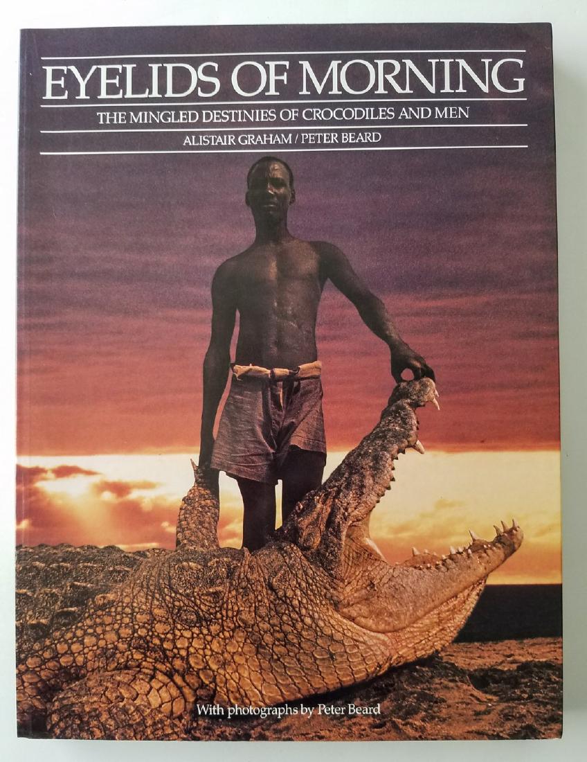 Eyelids of Morning Mingled Destinies Crocodiles and Men: Title: Eyelids of Morning. The Mingled Destinies of Crocodiles and Men. Author: Alistair Graham & Peter Beard. Publishing: San Francisco: 1973. Edition: First printing. Illustrated in color and b/w. P