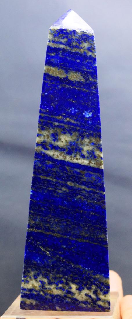 373 Gram lapis lazuli Obelisk: 373 Gram lapis lazuli Obelisk WEIGHT : 373 Gram Dimensions : 133*41*41 mm origin : Afghnaistan Please note that this lot has a confidential reserve. When you leave a bid in advance of the auction, sub