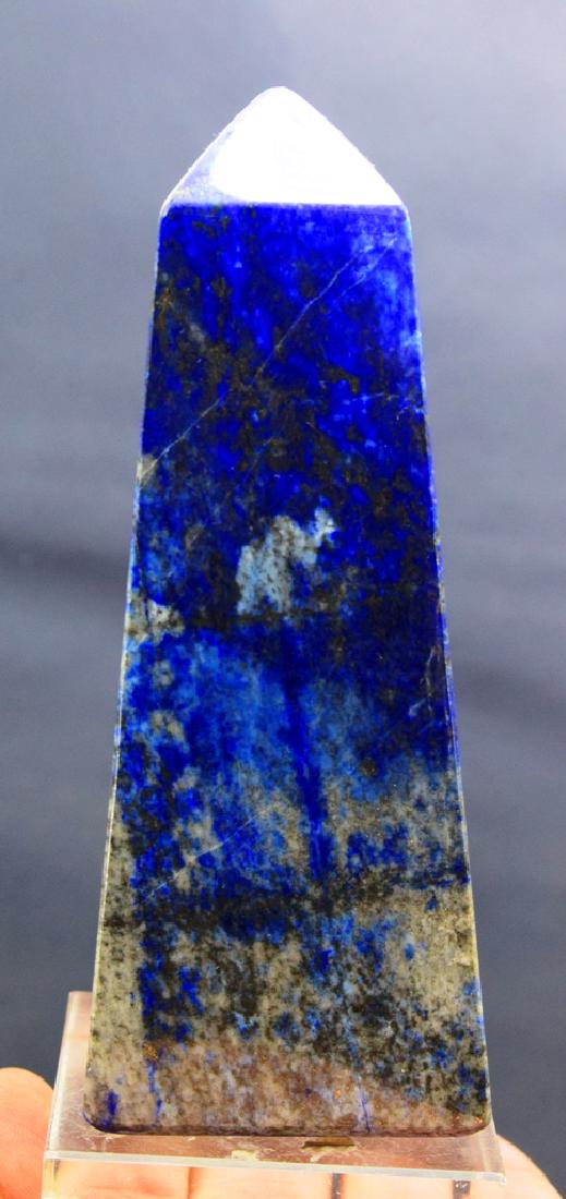 399 Gram lapis lazuli obelisk: 399 Gram lapis lazuli obelisk weight : 399 Gram Dimensions : 110*43*43 mm origin : Afghanistan Standard DHL Shipping Please note that this lot has a confidential reserve. When you leave a bid in advan